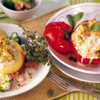 Gefüllte Paprika mit Hirse auf Schalottensauce