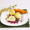 Kartoffelknödel mit Ganslfüllung auf Ingwer-Rahm-Rotkraut (QC)