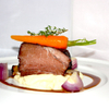 Prime Rib of Beef with Parsnip Puree, Red Onions and Glazed Baby Carrots