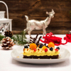 Weihnachtliche Vanillecreme auf Schokolade-Nuss-Kuchen