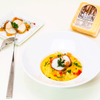 Cremiger Gelber Paprika-Maisgrieß mit Jakobsmuscheln im Speckmantel