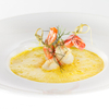 Karotten-Ingwer-Rahmsuppe mit Scampi