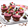 Schokolade-Cupcakes mit Heidelbeer-Topping