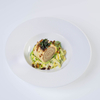 Vegane Kartoffel-Maroni Roulade auf cremigem Wirsing
