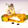 Zander in Kartoffelkruste mit Thymian-Speck-Sauce 